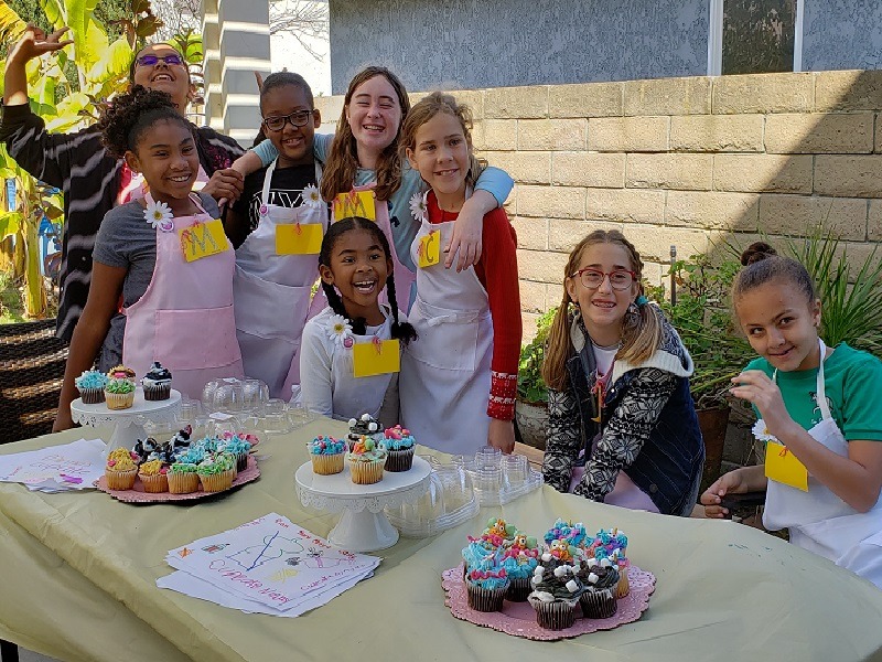 Teens group picture after decorating cupcakes
