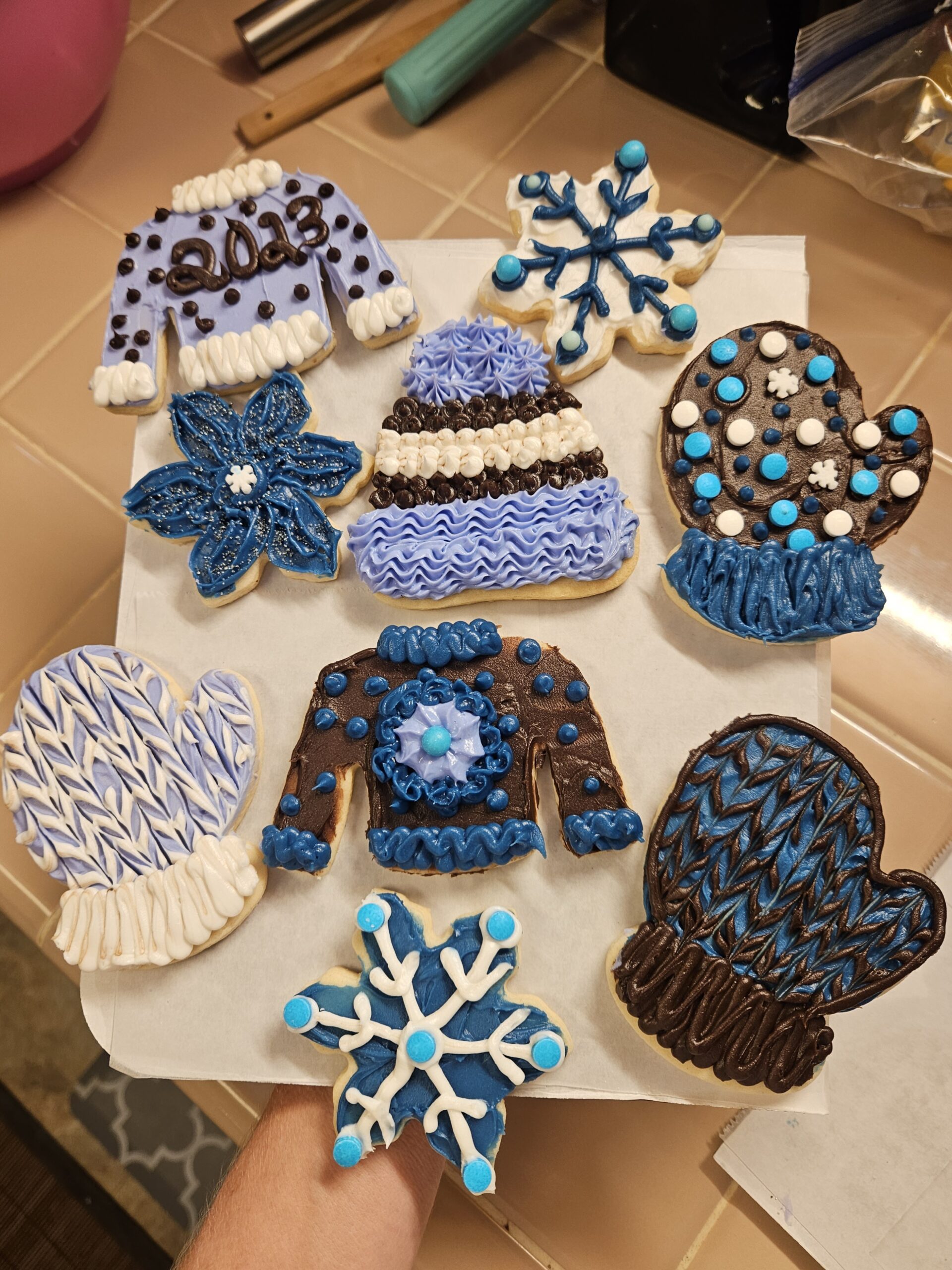 Baked winter clothes shaped cookies